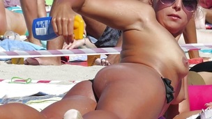 Stripped beach babes caught on camera by voyeur