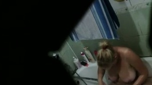 Kinky blonde haired nympho was caught while washing herself in bathroom